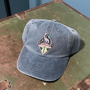 Dinosaur “escape” patch baseball cap